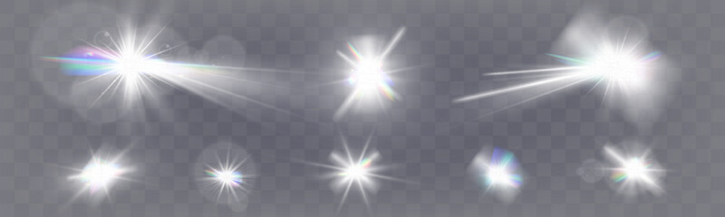 Set of glowing light effects with starbursts and radiating beams on a transparent background, ideal for overlays and decorations.