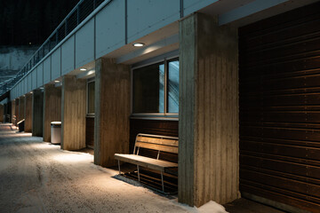 A minimalist modern building with a wooden facade, combining functionality and aesthetics in a sleek architectural design. Architectural magazines, urban development features, design portfolios.