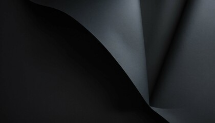 Minimalist dark paper background with smooth matte surface and soft folds