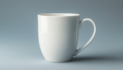 Fototapeta premium Blank white coffee mug isolated on a soft gray-blue background