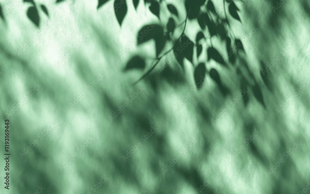 Poster a serene display of green foliage shadows casting over a textured surface, creating a calming and na
