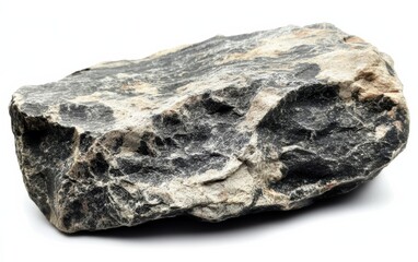 Fototapeta premium A close-up of a rough stone with textured surface and natural patterns, ideal for geological or natural-themed projects.
