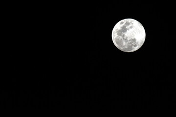 Close up the full moon on the night sky in Bangkok on January 13, 2025.