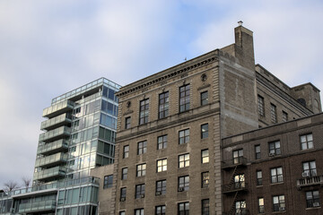 View of modern and old pre-war apartment buildings next to each other in Prospect Heights, Brooklyn, New York City, United States of America.