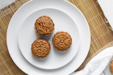 Overhead view of homemade mooncakes, top view of baked mooncakes, mooncakes for Lunar New Year and mid autumn festival