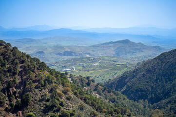 Naklejka premium Hiking trail to waterfalls over river Caballos, Sierra de la Nieves National Park in Tolox, Malaga, Spain