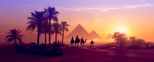 Egyptian pyramids in Giza at sunrise with silhouettes of travellers and camels caravan.