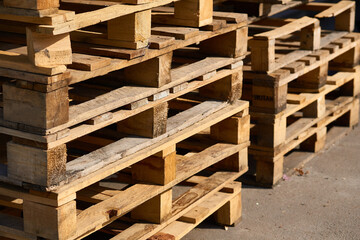 Wooden pallets made of boards for storage, loading, and carrying of goods