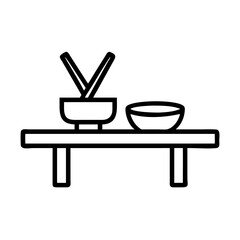 table with chopsticks and soy sauce icon