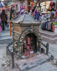 Temples and palaces, stifling smog and the smell of incense, a living goddess, the roar of horns, a whirlpool of people and a riot of colors - the capital of Nepal, Kathmandu.