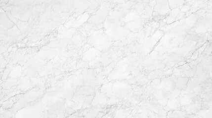 Luxurious white marble surface displaying natural veins and a polished finish, perfect for elegant design applications