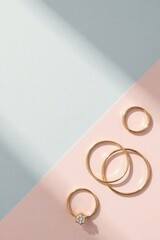 Elegant Gold Rings and Subtle Light on a Dual-Toned Background