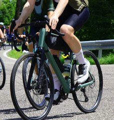 Fototapeta premium cycling race with cyclists pedaling vigorously and energetically on high-performance racing bikes