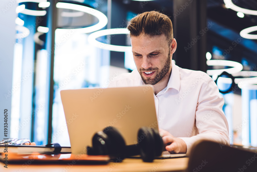 Poster successful professional expert creating software update and developing laptop system during worktime