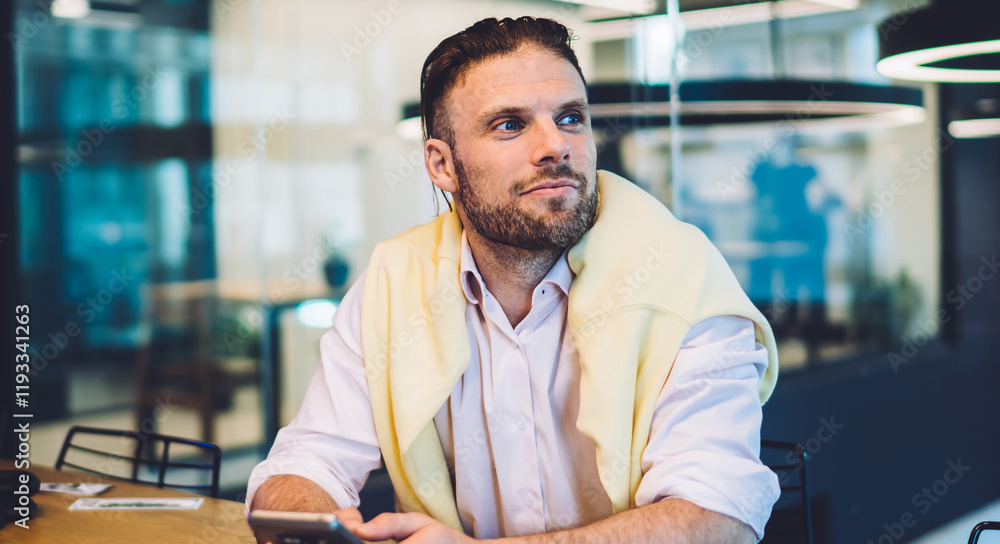Poster contemplative male trader with smartphone and netbook pondering on exchange offer on stock website, 
