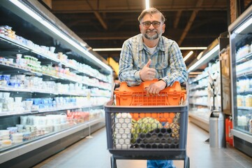 Senior man at supermarket store