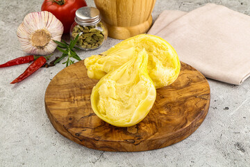 Italian traditional yellow Scamorza cheese