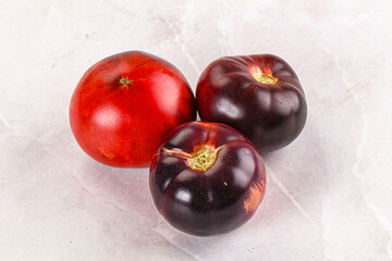 Black ripe juicy organic tomato