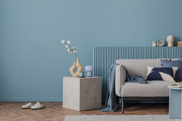 Elegant living space featuring soft tones, abstract decor, and a marble side table. A blend of...