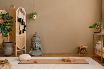 Close-up of a Buddha statue with meditation props and incense smoke. A harmonious setting for tranquility and focus.