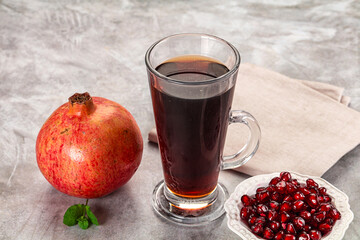 Sweet fresh pomegranate juice with fruit