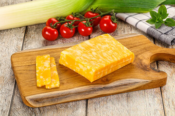 Marble yellow cheese with slices