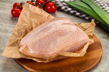 Raw chicken breast with bone