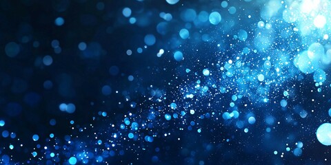 Obraz premium Sparkling Blue Bokeh Particles Background with a dynamic and sparkling effect