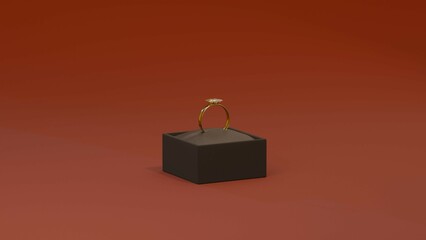 A shiny gold engagement ring inside an open black jewelry box, set against a rich red background. A symbol of romance and elegance