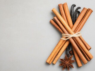 Neatly Bundled Vanilla Pods and Cinnamon Sticks