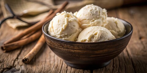 Fototapeta premium Creamy Vanilla Ice Cream Scoops in a Rustic Bowl with Cinnamon Sticks on a Wooden Surface
