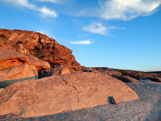 Coastal cliff at sunset.