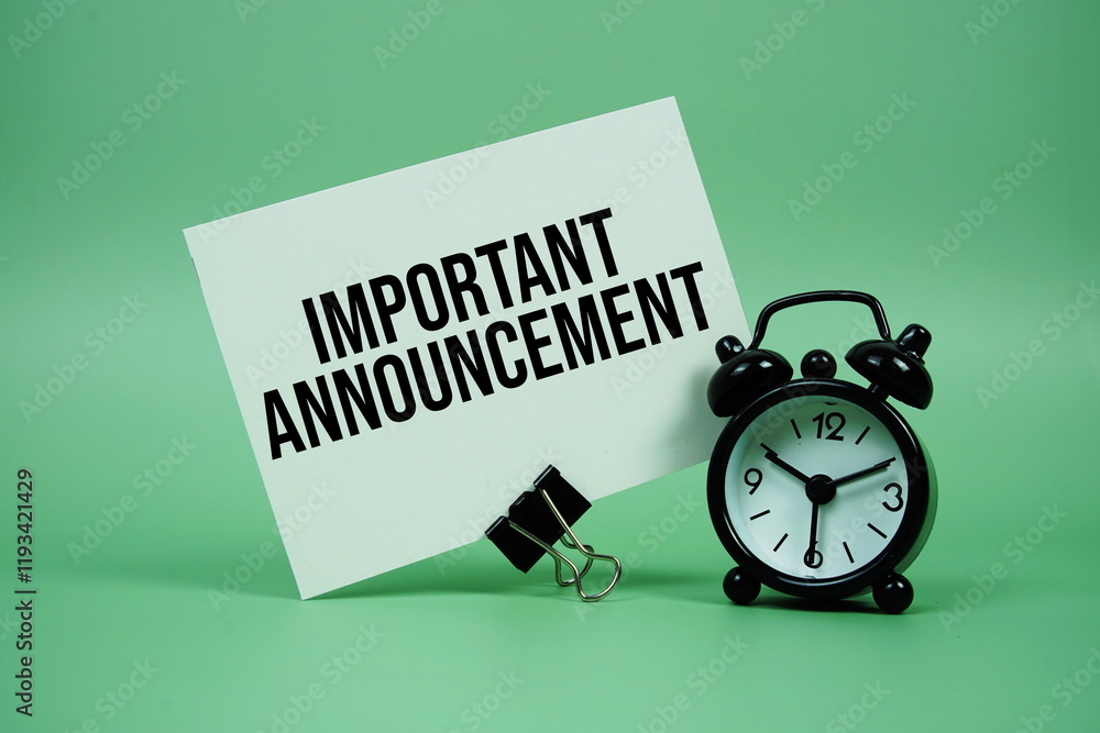 Poster important announcement text message on paper card with alarm clock on green background