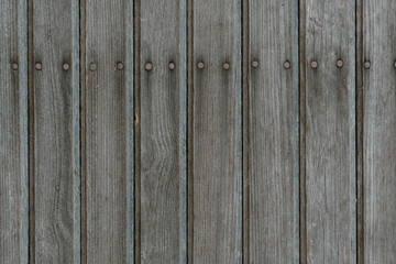 gray aged wooden boards with nails