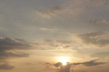 Beautiful sky with natural gradations. Thick clouds in the dusk sky on a winter night. Image of a cloudy sky in the afternoon. View of the night sky with golden light from the evening sun