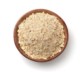 Dry rolled oatmeal in wooden bowl