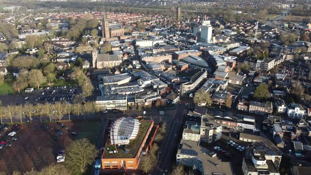 Raalte, the Netherlands - January 10th 2025: Aerial footage of the town center. Drone descending down towards the center from high altitude. 