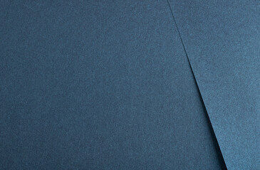 Blue metallic paper background with a shiny gradient and smooth, layered surface. Rich pacific deep...