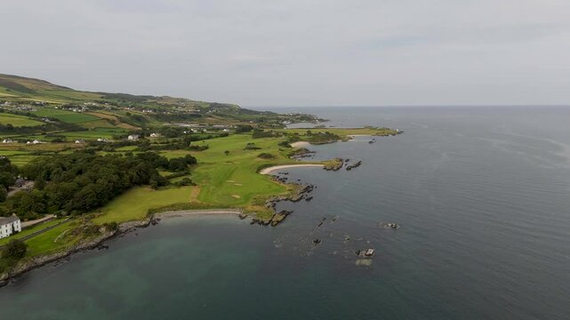 Aerial view of the beautiful coast at greencastle whith loads of beaches and even a golf course in county Donegal, Ireland