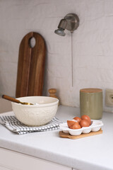 A charming rustic kitchen scene displaying a beautiful bowl filled with fresh ingredients.