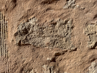 Close-up of weathered stone wall texture