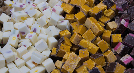 mixed fudge sweets on a retail shop stall