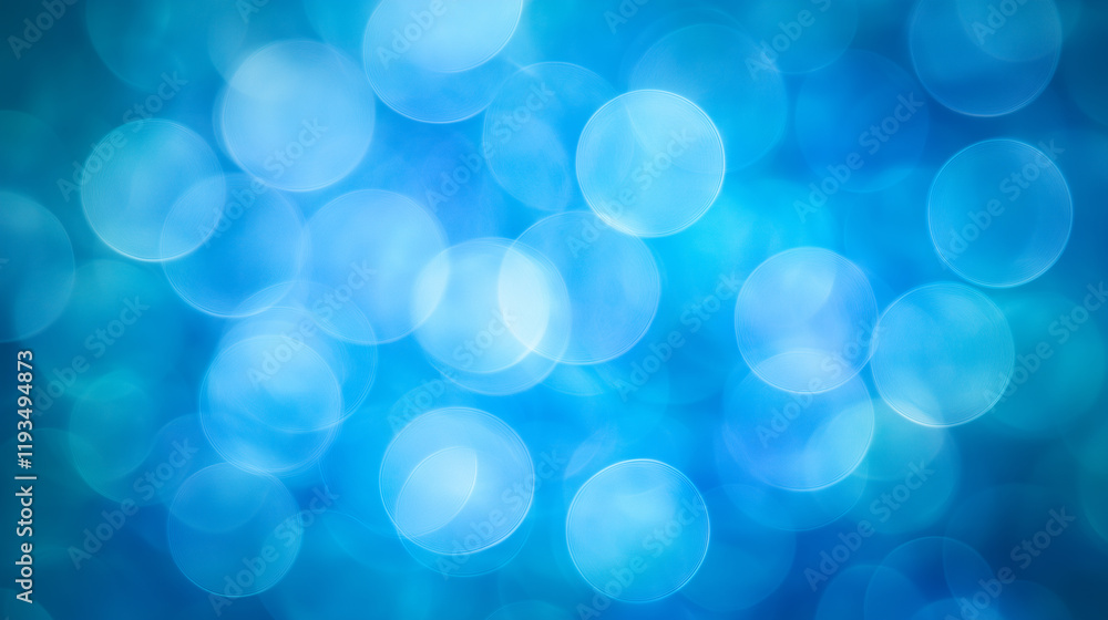 Wall mural bright blue bokeh background with soft circular shapes creating a dreamy atmosphere for design proje