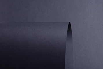 Steel blue paper background with curved details and a matte, grainy texture. Smooth violet tones...