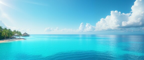 Fototapeta premium A beautiful blue ocean with a few palm trees in the background