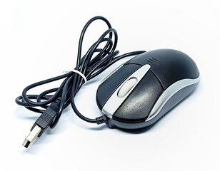 Computer mouse with Bokeh background.Mouse hardware with wire isolated over white background.Used old mouse hardware with USB cable.External hardware of computer system.