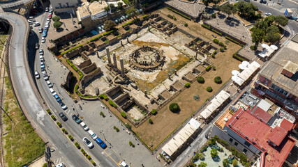 Fototapeta premium Aerial view the Macellum of Pozzuoli, near Naples, Italy. It was market building of the Roman colony of Puteoli. It was mistakenly known as the Temple of Serapis.