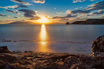 Obraz premium Golden Sunset Over Malaga Coast