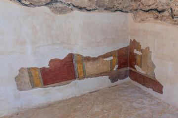 The fresco paintings on the walls of the ancient bath house at Masada in the Judean Desert in...
