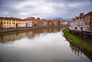 Pisa, Italy skyline on the Arno River with Chiesa di Santa Maria della Spina.